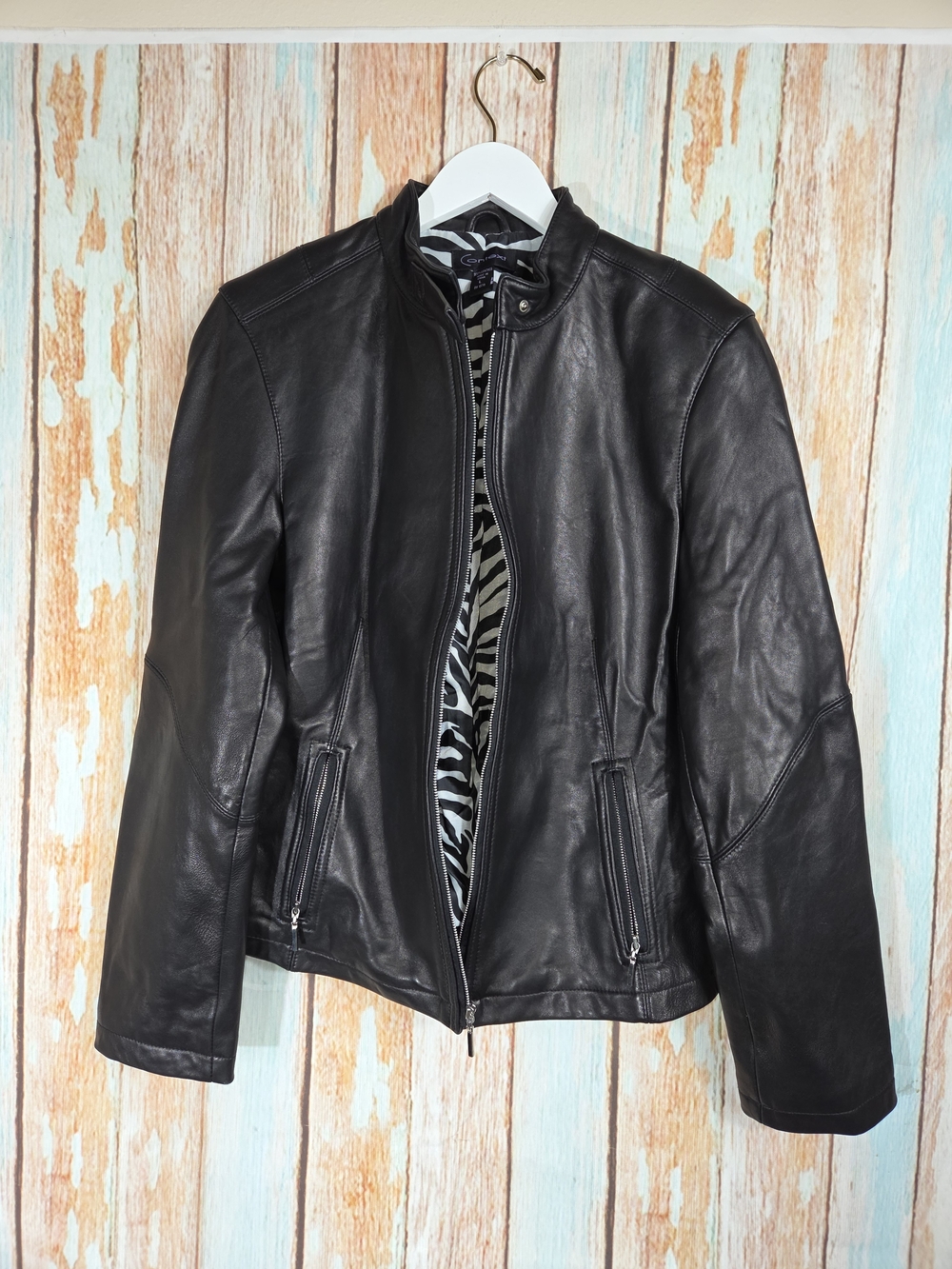 Context Y2k Black Leather Moto Jacket featuring a distinctive zebra-print. L